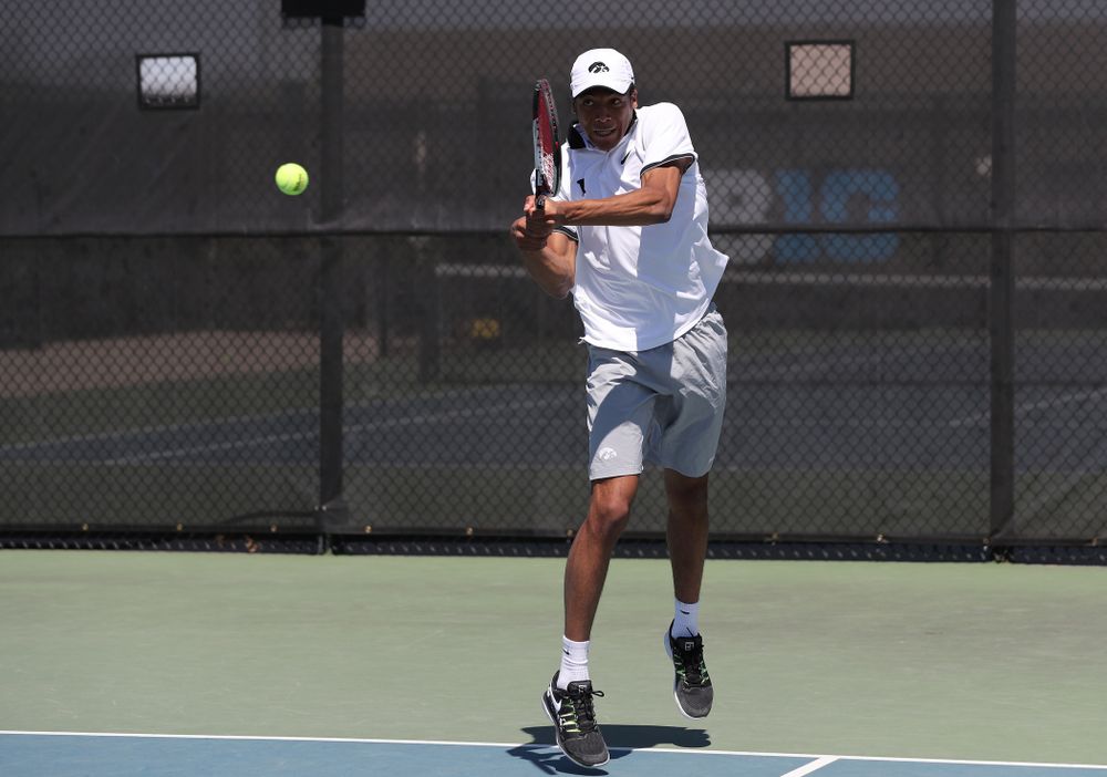IowaÕs Oliver Okonkwo and Will Davies play a doubles match against the Michigan Wolverines Sunday, April 21, 2019 at the Hawkeye Tennis and Recreation Complex. (Brian Ray/hawkeyesports.com)