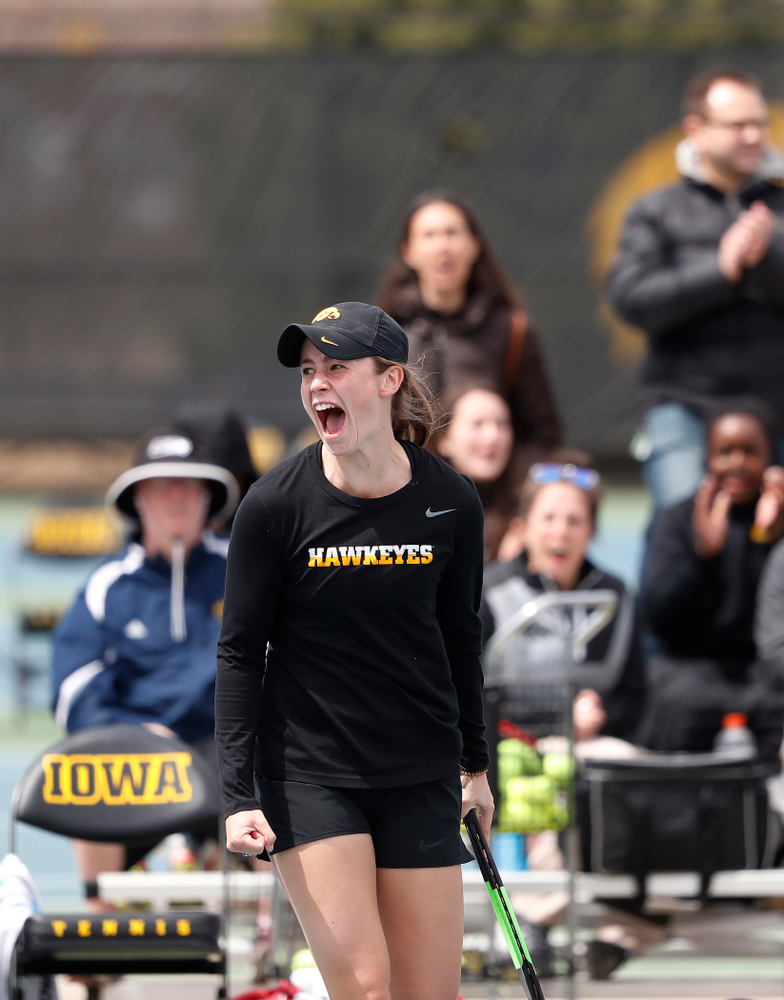 Elise Van Heuvelen and Anastasia Reimchen play a doubles match against the Wisconsin Badgers Sunday, April 22, 2018 at the Hawkeye Tennis and Recreation Center. (Brian Ray/hawkeyesports.com)