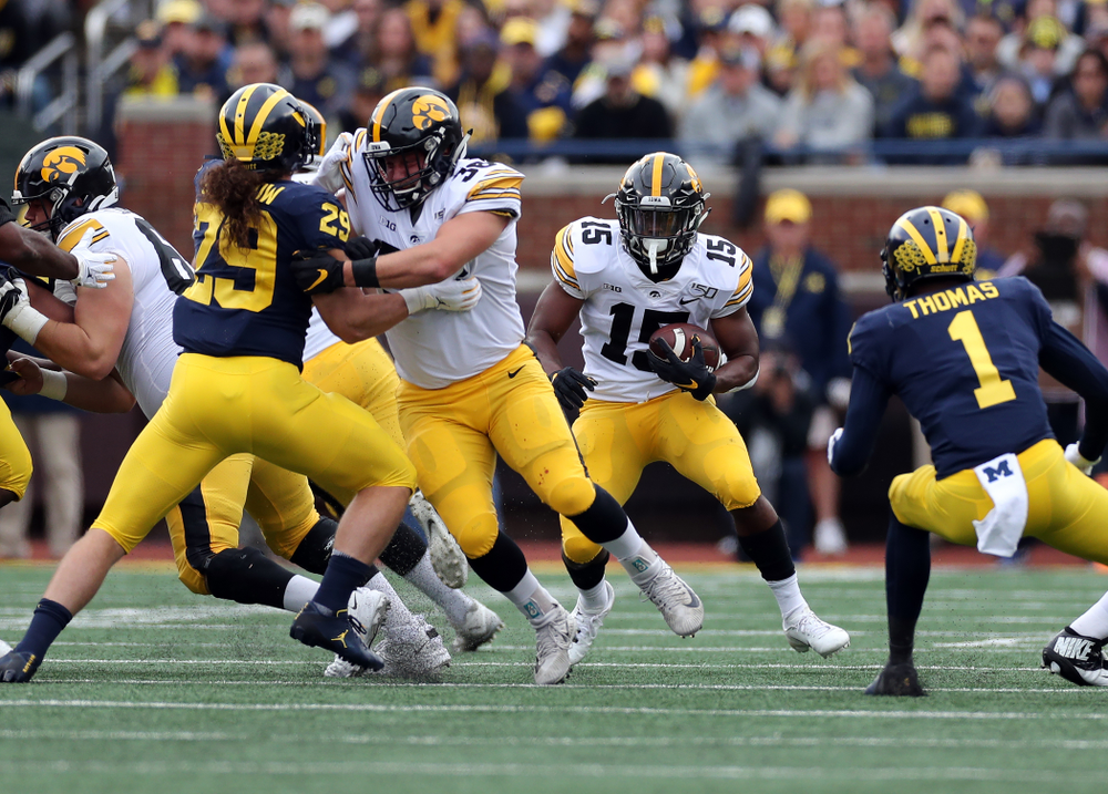 Iowa Hawkeyes running back Tyler Goodson (15) and fullback Brady Ross (36) against the Michigan Wolverines Saturday, October 5, 2019 at Michigan Stadium in Ann Arbor, MI. (Brian Ray/hawkeyesports.com)