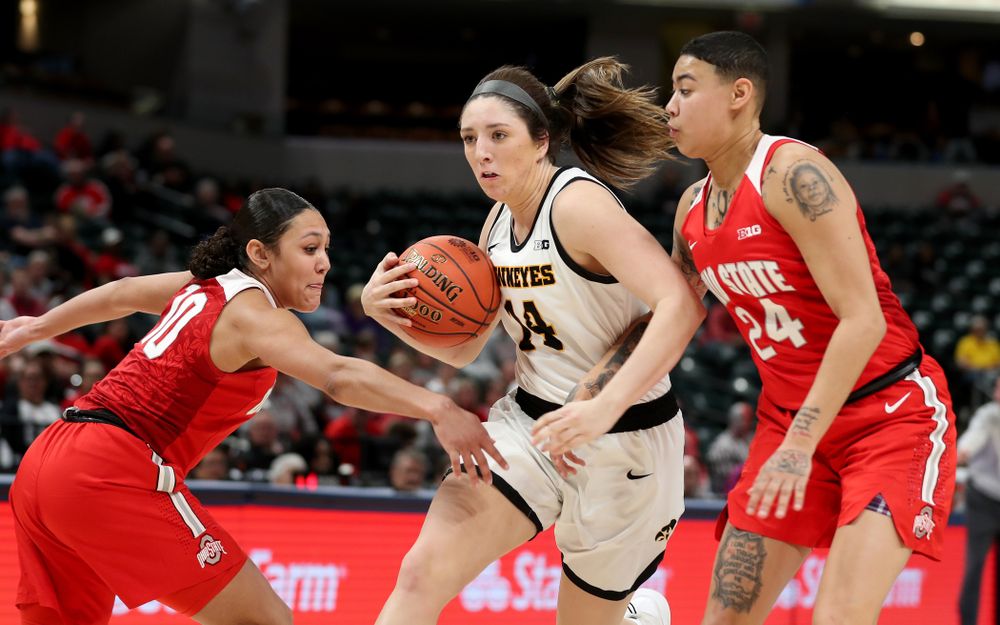 Iowa Hawkeyes forward McKenna Warnock (14) against Ohio State in the quarterfinals of the Big Ten Basketball Tournament Friday, March 6, 2020 at Bankers Life Fieldhouse in Indianapolis. (Brian Ray/hawkeyesports.com)