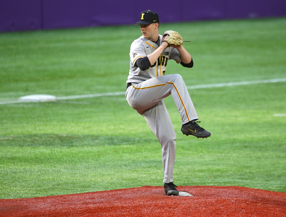 Iowa Hawkeyes pitcher Cam Baumann (35) delivers to the plate during the eighth inning of their CambriaCollegeClassic game at U.S. Bank Stadium in Minneapolis, Minn. on Friday, February 28, 2020. (Stephen Mally/hawkeyesports.com)