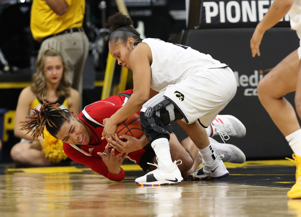 Iowa Hawkeyes guard Tania Davis (11) against the Rutgers Scarlet Knights Wednesday, January 23, 2019 at Carver-Hawkeye Arena. (Brian Ray/hawkeyesports.com)