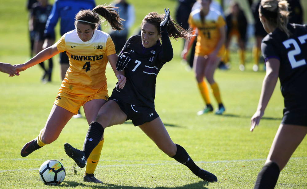 Iowa Hawkeyes forward Kaleigh Haus (4) dribbles the ball during a game against Northwestern at the Iowa Soccer Complex on October 21, 2018. (Tork Mason/hawkeyesports.com)