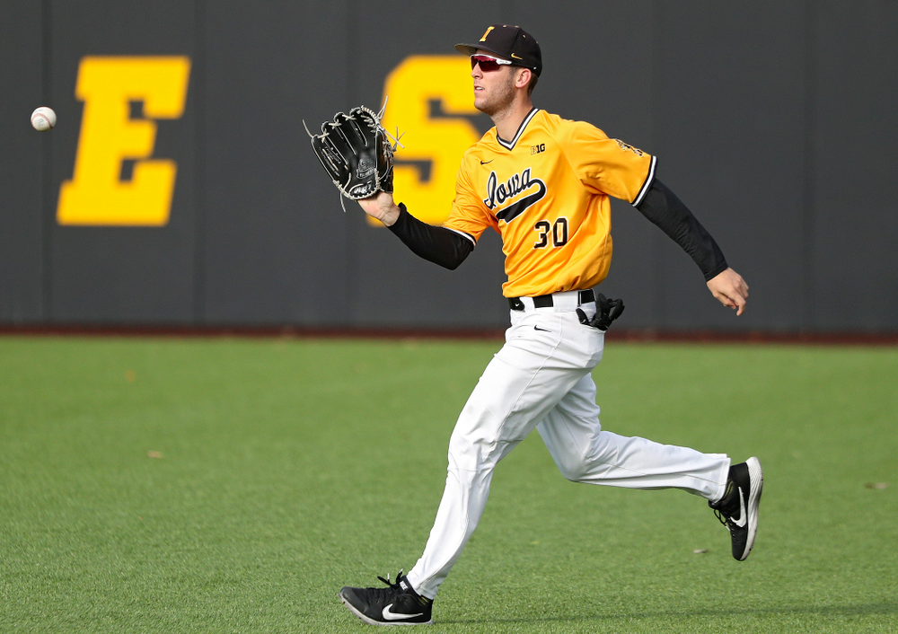 Iowa outfielder Connor McCaffery (30) fields a hit during the third inning of the first game of the Black and Gold Fall World Series at Duane Banks Field in Iowa City on Tuesday, Oct 15, 2019. (Stephen Mally/hawkeyesports.com)