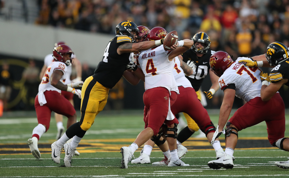 Iowa Hawkeyes defensive end A.J. Epenesa (94) strips the ball from Iowa State Cyclones quarterback Zeb Noland (4) Saturday, September 8, 2018 at Kinnick Stadium. (Max Allen/hawkeyesports.com)