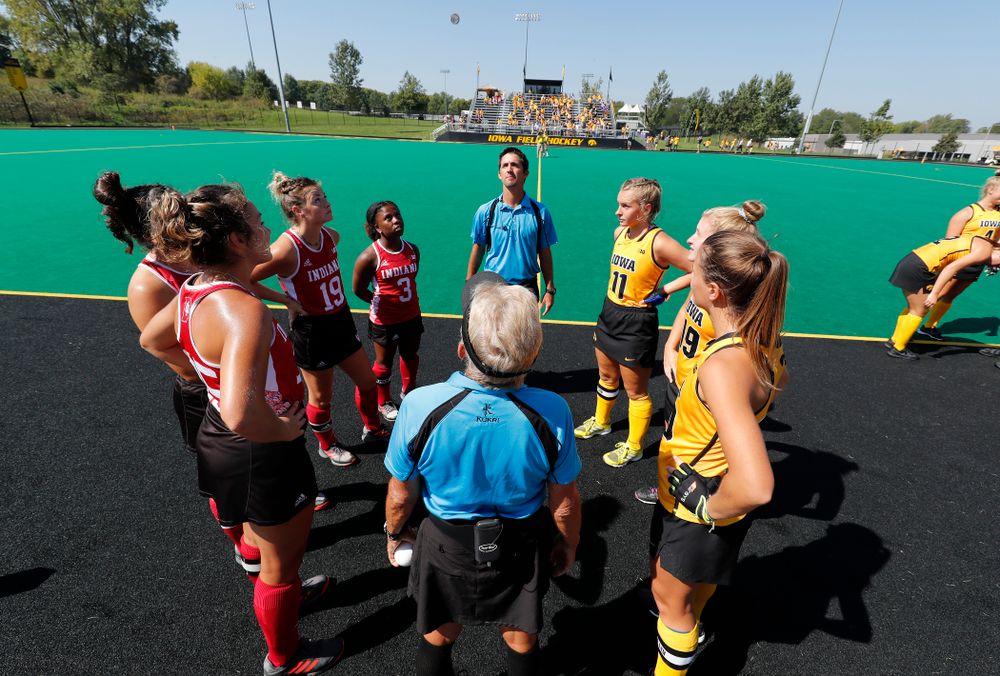 Iowa Hawkeyes captains Katie Birch (11), Ryley Miller (19), and Sophie Sunderland (20) stand for the coin toss before their game against Indiana Sunday, September 16, 2018 at Grant Field. (Brian Ray/hawkeyesports.com)