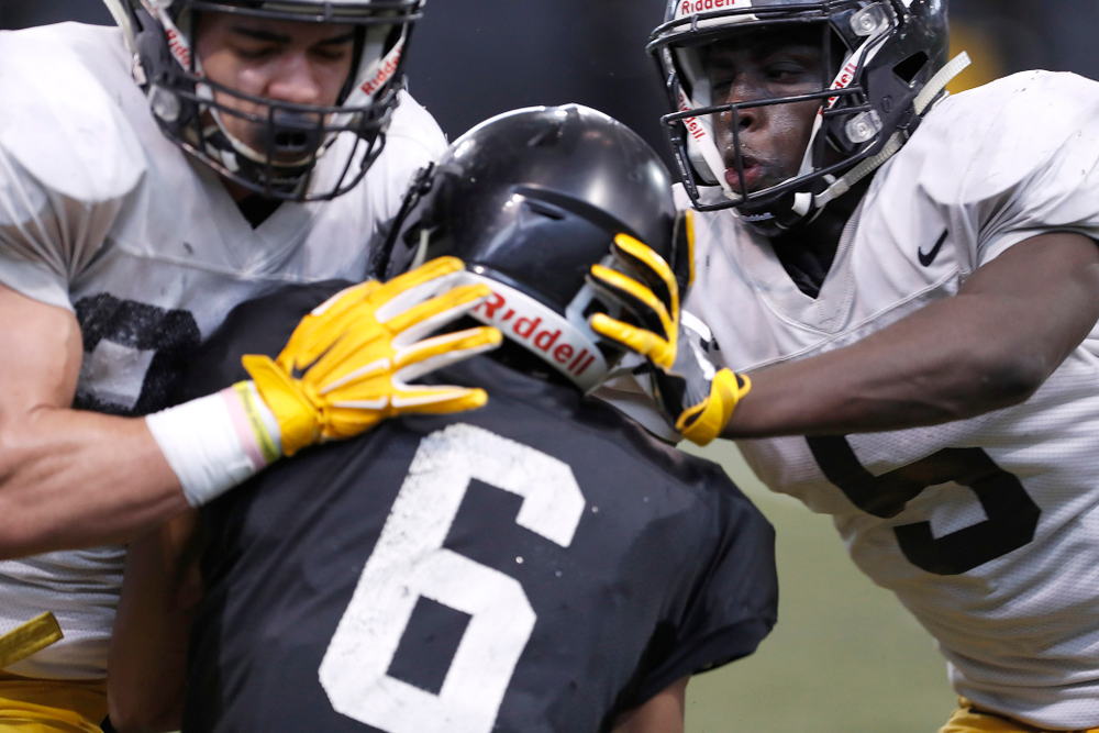 Amani Hooker, Ihmir Smith-Marsette, Manny Rugamba -- University of Iowa spring football practice No. 6 on March 31, 2018, in Iowa City, Iowa. (Darren Miller/hawkeyesports.com)