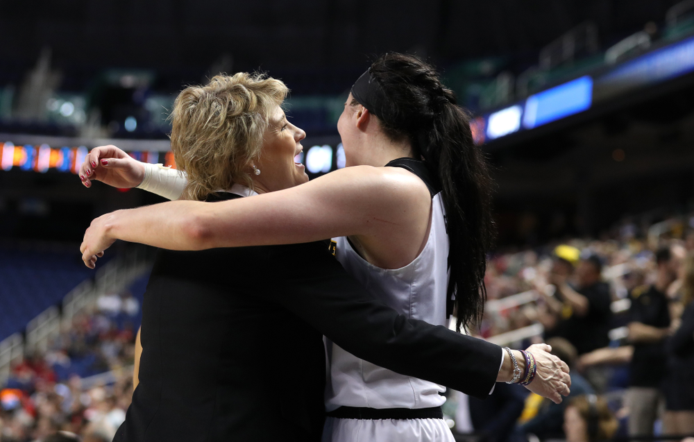 Iowa Hawkeyes head coach Lisa Bluder and forward Megan Gustafson (10) against the NC State Wolfpack in the regional semi-final of the 2019 NCAA Women's College Basketball Tournament Saturday, March 30, 2019 at Greensboro Coliseum in Greensboro, NC.(Brian Ray/hawkeyesports.com)