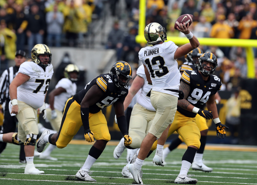 Iowa Hawkeyes defensive tackle Daviyon Nixon (54) and defensive end A.J. Epenesa (94) against the Purdue Boilermakers Saturday, October 19, 2019 at Kinnick Stadium. (Brian Ray/hawkeyesports.com)