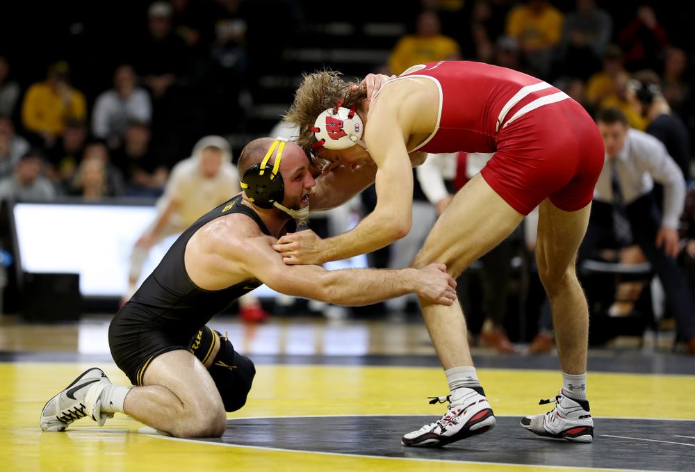IowaÕs Alex Marinelli wrestles WisconsinÕs Evan Wick at 165 pounds Sunday, December 1, 2019 at Carver-Hawkeye Arena. Marinelli won the match 4-2. (Brian Ray/hawkeyesports.com)
