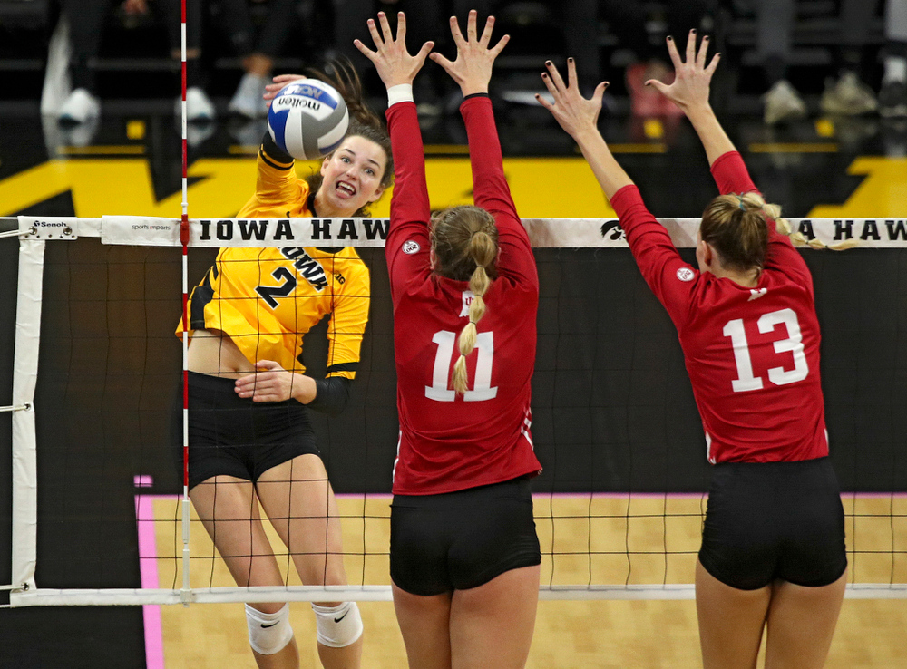 Iowa’s Courtney Buzzerio (2) lines up a shot during their match at Carver-Hawkeye Arena in Iowa City on Sunday, Oct 20, 2019. (Stephen Mally/hawkeyesports.com)