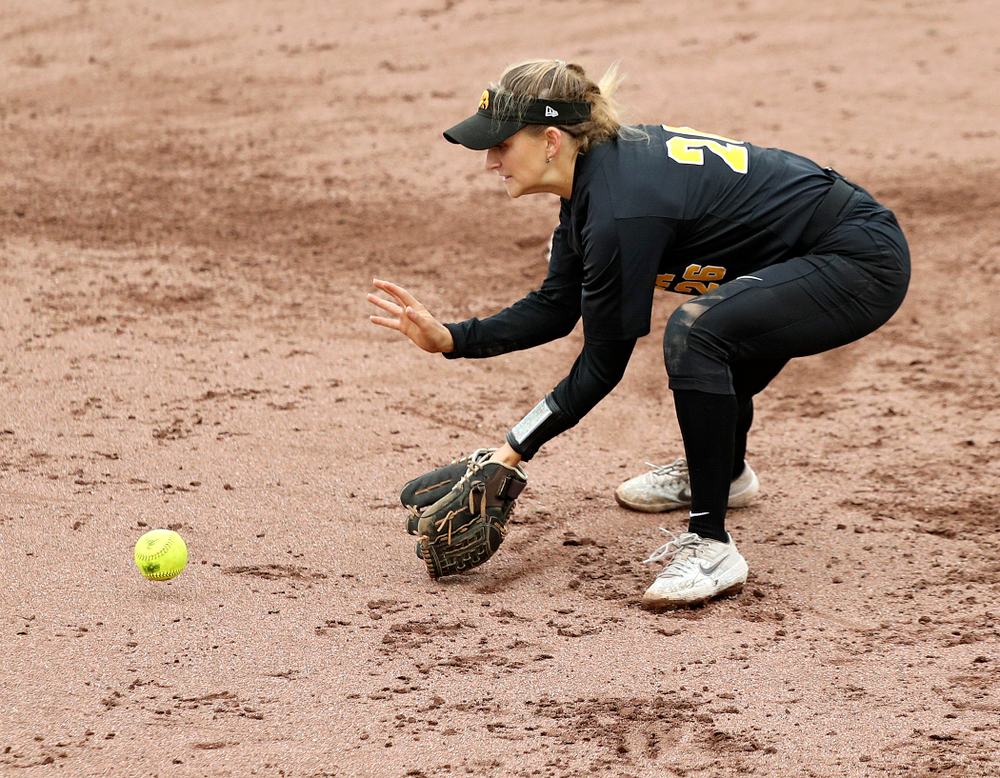 Iowa infielder Mia Ruther (26) fields a ground ball before throwing to first for an out during the sixth inning of their game against Iowa Softball vs Indian Hills Community College at Pearl Field in Iowa City on Sunday, Oct 6, 2019. (Stephen Mally/hawkeyesports.com)