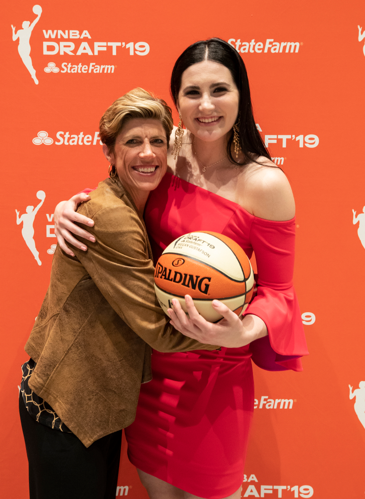 Iowa Hawkeyes forward Megan Gustafson (10) with associate head coach Jan Jensen after being selected by the Dallas Wings in the second round of the 2019 WNBA Draft Wednesday, April 10, 2019 at Nike New York Headquarters in New York City. (Brian Ray/hawkeyesports.com)