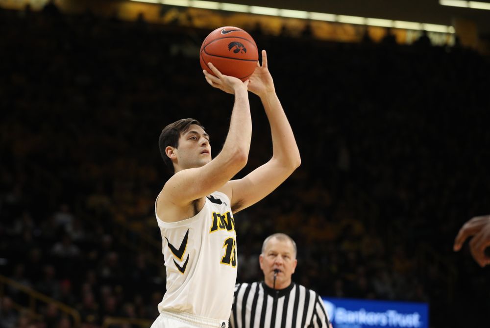 Iowa Hawkeyes forward Ryan Kriener (15) knocks down a three point basket against the Michigan Wolverines Friday, February 1, 2019 at Carver-Hawkeye Arena. (Brian Ray/hawkeyesports.com)