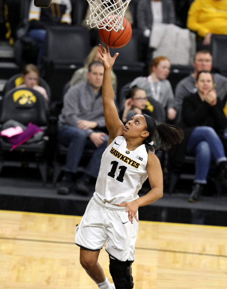 Iowa Hawkeyes guard Tania Davis (11) against the Wisconsin Badgers Monday, January 7, 2019 at Carver-Hawkeye Arena. (Brian Ray/hawkeyesports.com)