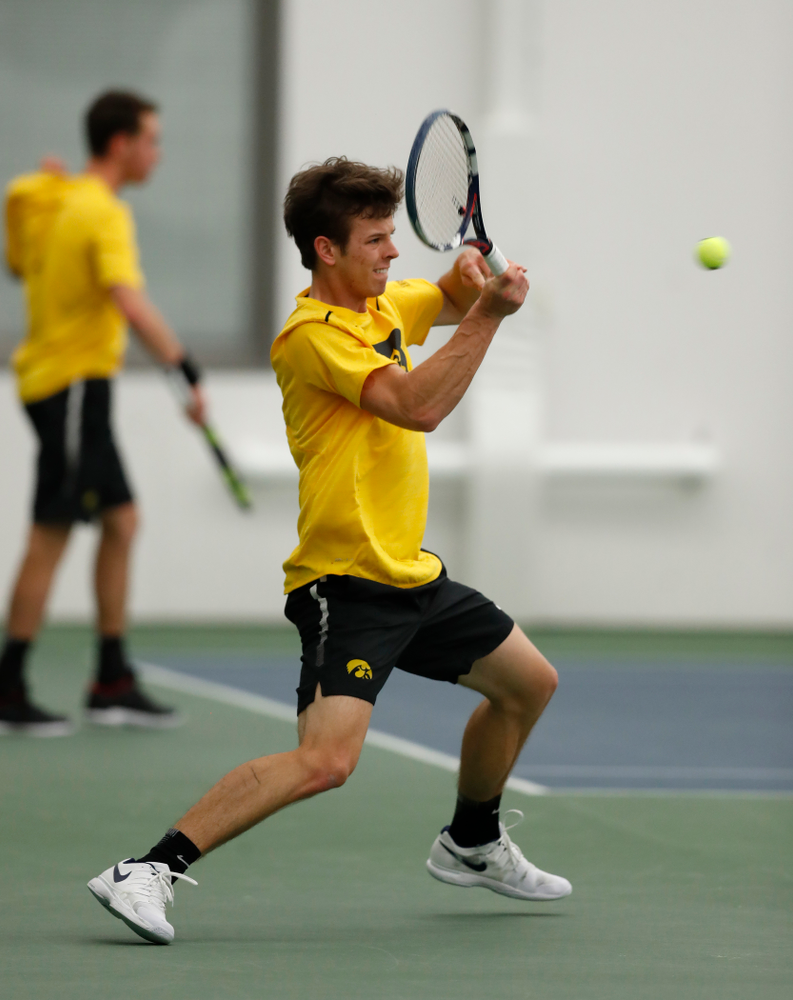 Piotr Smietana against the Illinois Fighting Illini Saturday, March 31, 2018 at Hawkeye Tennis and Recreation Center. (Brian Ray/hawkeyesports.com)