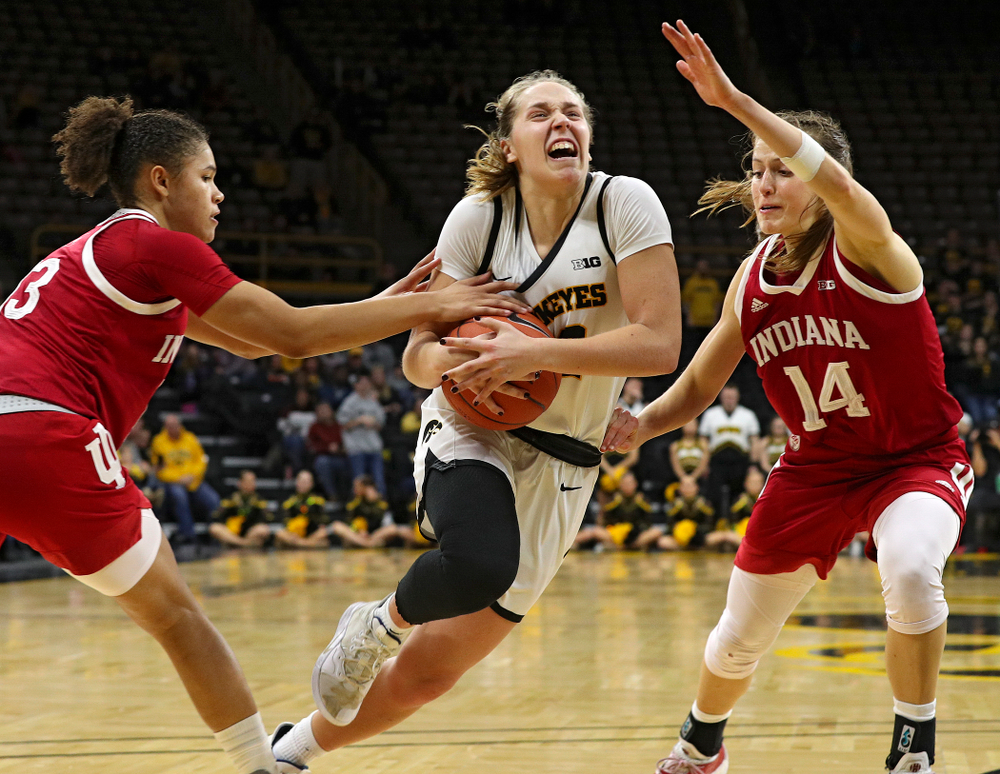 Iowa Hawkeyes guard Kathleen Doyle (22) drives to the basket and scores during the second overtime period of their game at Carver-Hawkeye Arena in Iowa City on Sunday, January 12, 2020. (Stephen Mally/hawkeyesports.com)