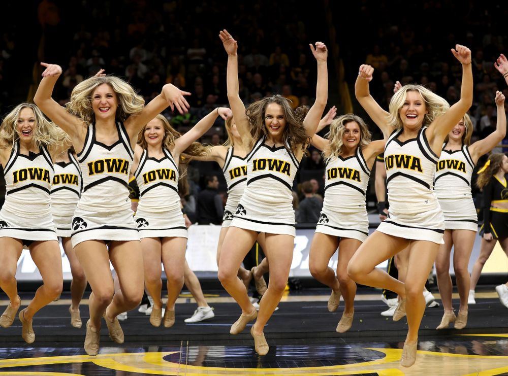 The Iowa Cheerleaders and Dance Team perform on senior night at half-time of the Iowa Hawkeyes game against the Purdue Boilermakers Tuesday, March 3, 2020 at Carver-Hawkeye Arena. (Brian Ray/hawkeyesports.com)