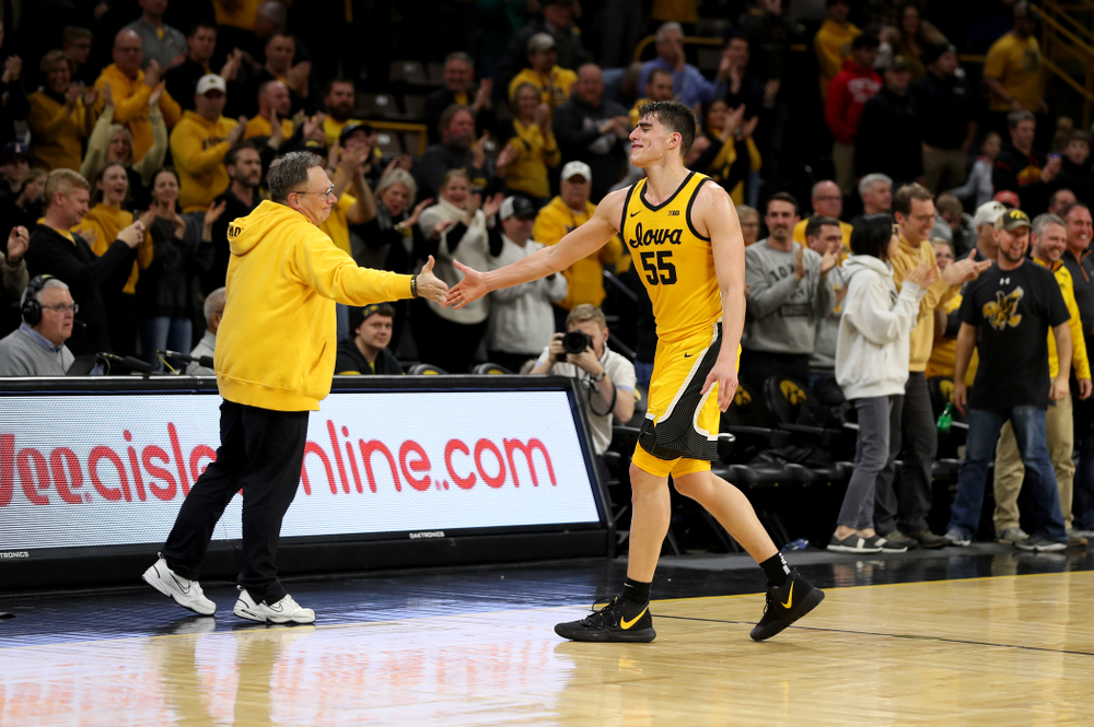 Iowa Hawkeyes forward Luka Garza (55) celebrates late in the game against the Rutgers Scarlet Knights Wednesday, January 22, 2020 at Carver-Hawkeye Arena. (Brian Ray/hawkeyesports.com)