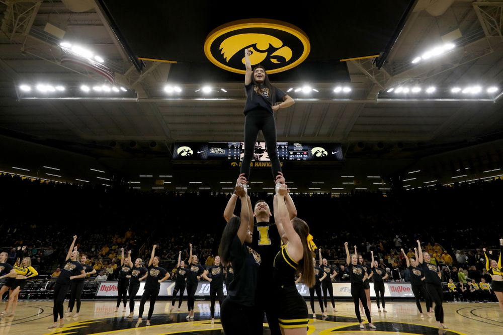 The Iowa Spirit Squad performs with participants in Spirit Squad Day at halftime of the Iowa Hawkeyes game against the Nebraska Cornhuskers Saturday, February 8, 2020 at Carver-Hawkeye Arena. (Brian Ray/hawkeyesports.com)