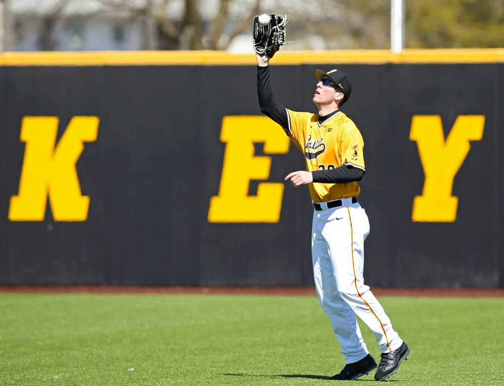 Iowa Hawkeyes right fielder Connor McCaffery (30) pulls in a fly ball for an out during the second inning against Illinois at Duane Banks Field in Iowa City on Sunday, Mar. 31, 2019. (Stephen Mally/hawkeyesports.com)