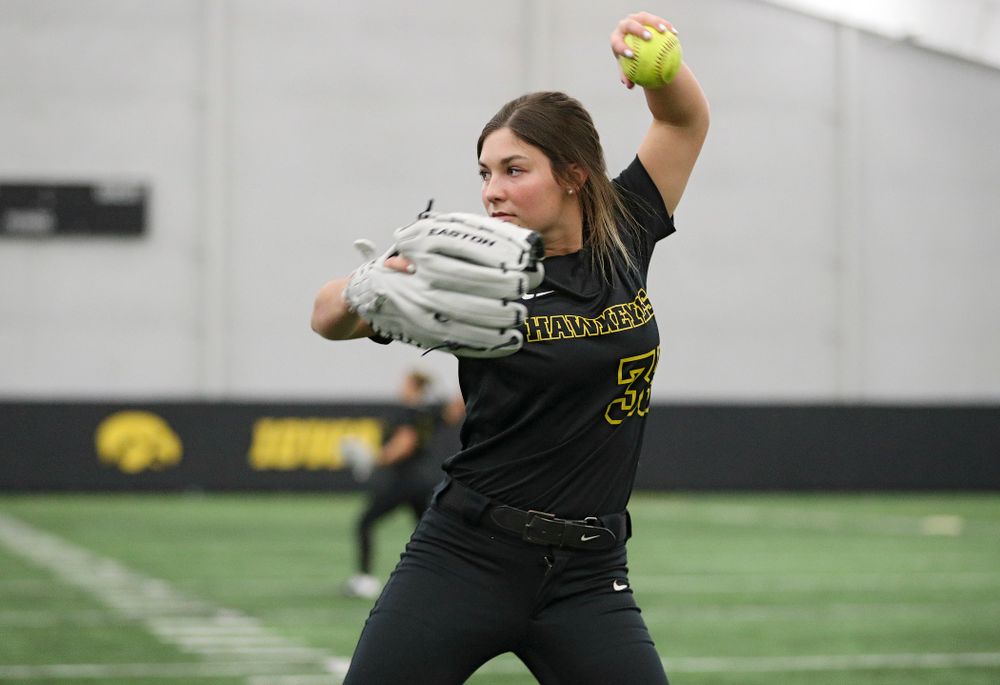 Iowa outfielder Riley Sheehy (33) warms up for practice during Iowa Softball Media Day at the Hawkeye Tennis and Recreation Complex in Iowa City on Thursday, January 30, 2020. (Stephen Mally/hawkeyesports.com)