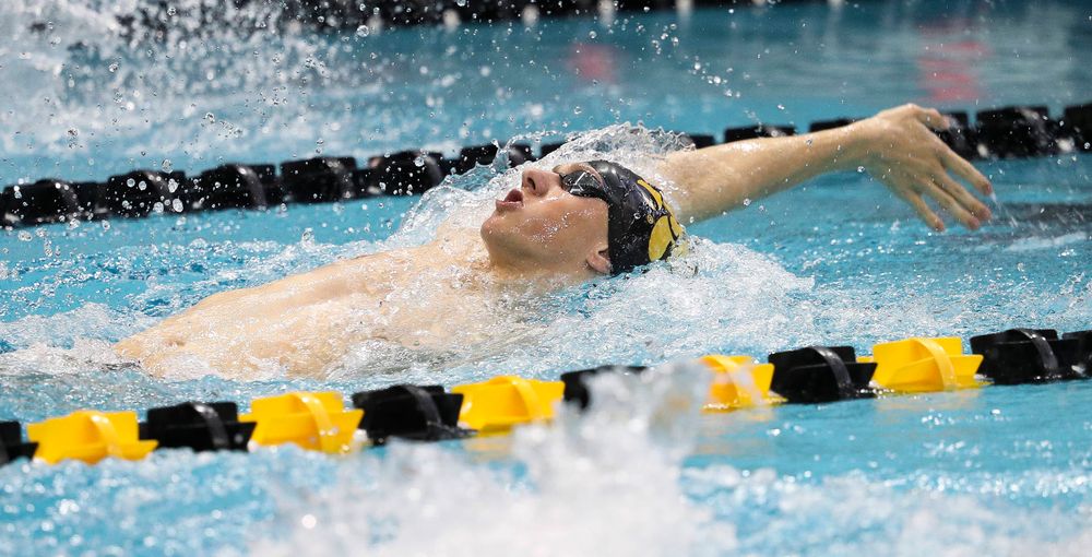Iowa's John Colin competes in the 200-yard backstroke during a meet against Michigan and Denver at the Campus Recreation and Wellness Center on November 3, 2018. (Tork Mason/hawkeyesports.com)