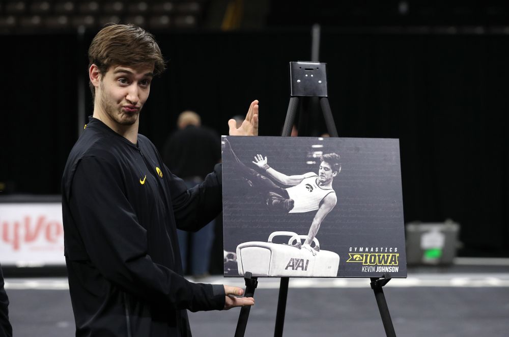 Iowa Men's Gymnast Kevin Johnson and his family during senior day ceremonies following their meet against the Ohio State Buckeyes Saturday, March 16, 2019 at Carver-Hawkeye Arena. (Brian Ray/hawkeyesports.com)