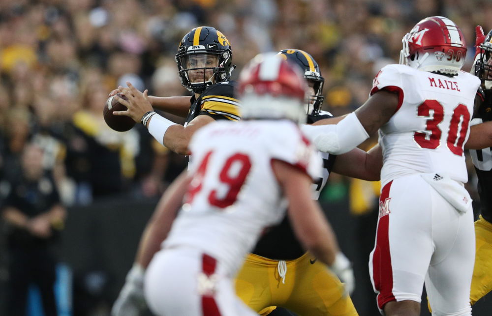 Iowa Hawkeyes quarterback Nate Stanley (4) against the Miami RedHawks Saturday, August 31, 2019 at Kinnick Stadium in Iowa City. (Brian Ray/hawkeyesports.com)