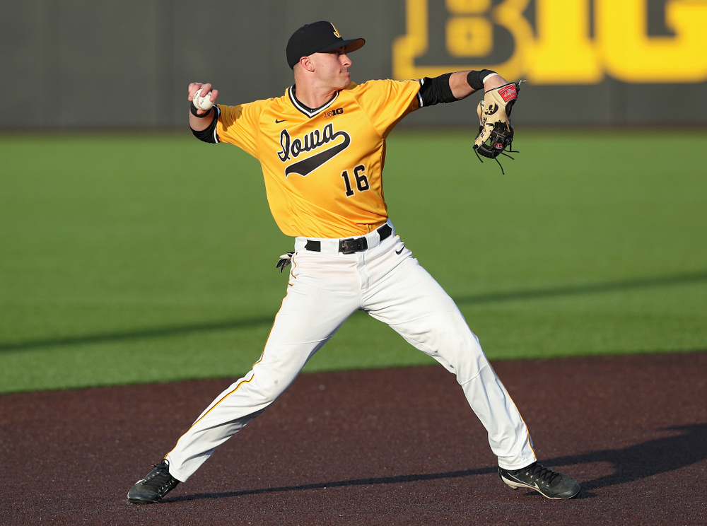 Iowa Hawkeyes shortstop Tanner Wetrich (16) throws to first base for an out during the seventh inning of their game against Northern Illinois at Duane Banks Field in Iowa City on Tuesday, Apr. 16, 2019. (Stephen Mally/hawkeyesports.com)