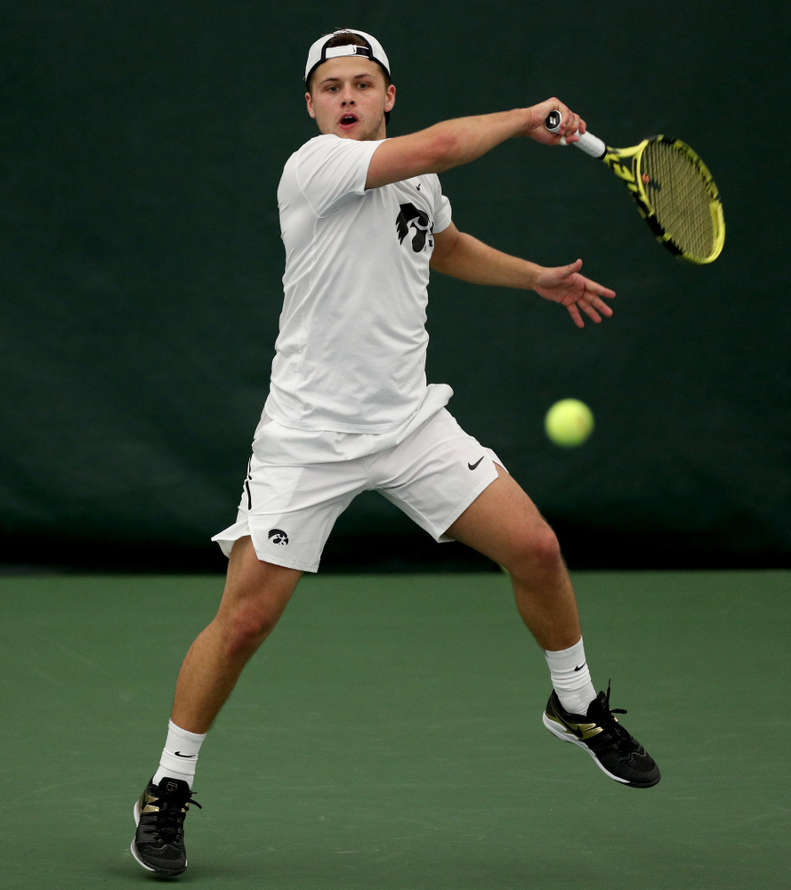 Iowa’s Will Davies against Cornell Sunday, March 8, 2020 at the Hawkeye Tennis and Recreation Center. (Brian Ray/hawkeyesports.com)