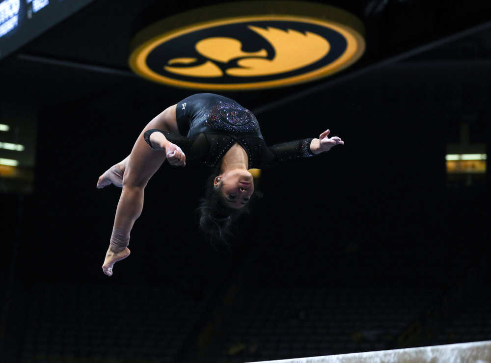 Iowa’s Claire Kaji competes on the beam against Michigan Friday, February 14, 2020 at Carver-Hawkeye Arena. (Brian Ray/hawkeyesports.com)