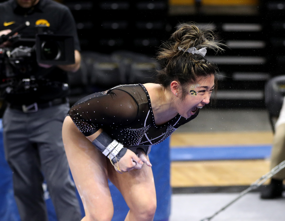 Iowa's Nicole Chow competes on the bars against Illinois Saturday, February 16, 2019 at Carver-Hawkeye Arena. (Brian Ray/hawkeyesports.com)