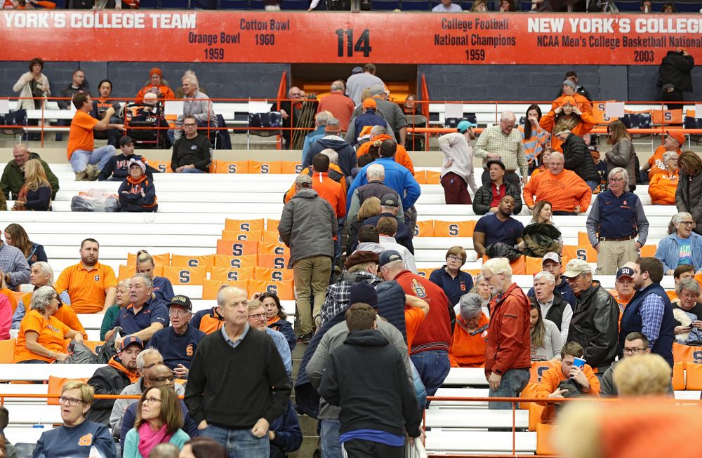 Syracuse Orange fans stream to the exits during the second half of their ACC/Big Ten Challenge game at the Carrier Dome in Syracuse, N.Y. on Tuesday, Dec 3, 2019. (Stephen Mally/hawkeyesports.com)