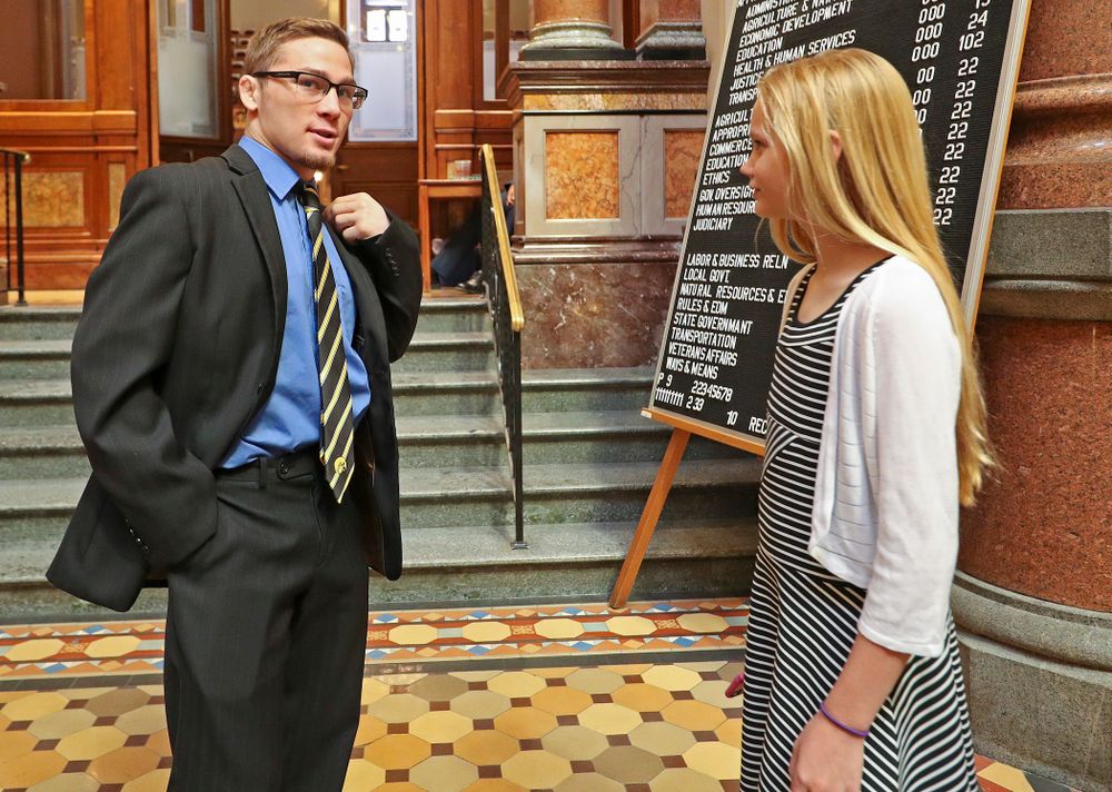 Iowa's Spencer Lee talks with a young fan at the Iowa State Capitol Building on Tuesday, Apr. 9, 2019. (Stephen Mally/hawkeyesports.com)