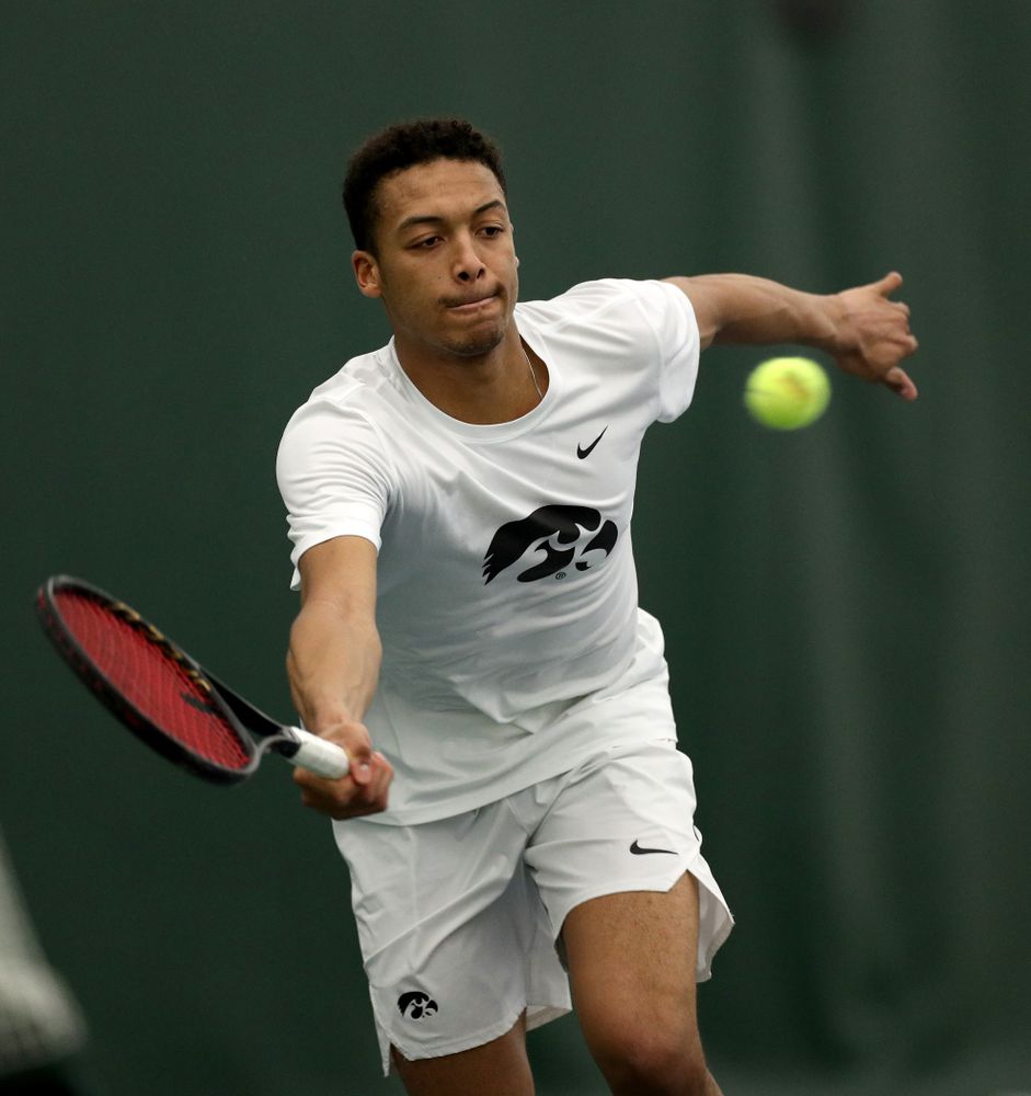 Iowa’s Oliver Okonkwo against Cornell Sunday, March 8, 2020 at the Hawkeye Tennis and Recreation Center. (Brian Ray/hawkeyesports.com)