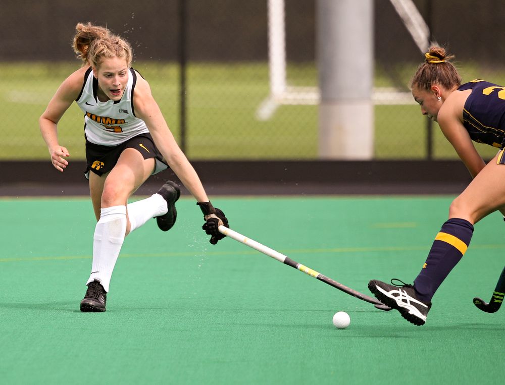 Iowa’s Sofie Stribos (9) reaches for the ball during the first quarter of their game at Grant Field in Iowa City on Friday, Sep 13, 2019. (Stephen Mally/hawkeyesports.com)