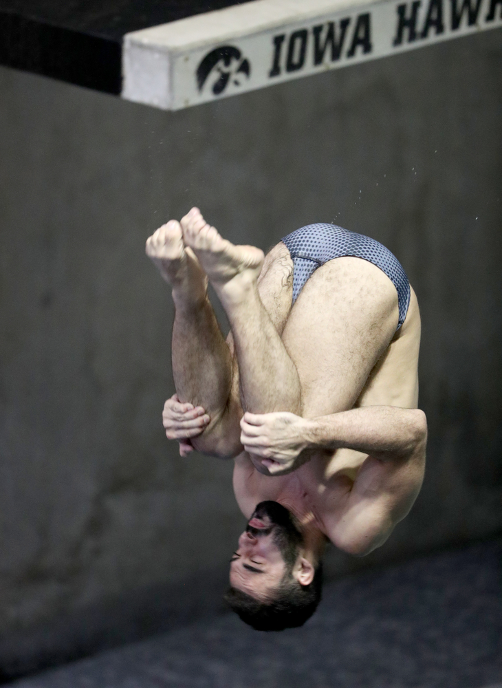 IowaÕs Mohamed Neuman competes on the 1 meter springboard against Notre Dame and Illinois Saturday, January 11, 2020 at the Campus Recreation and Wellness Center. (Brian Ray/hawkeyesports.com)