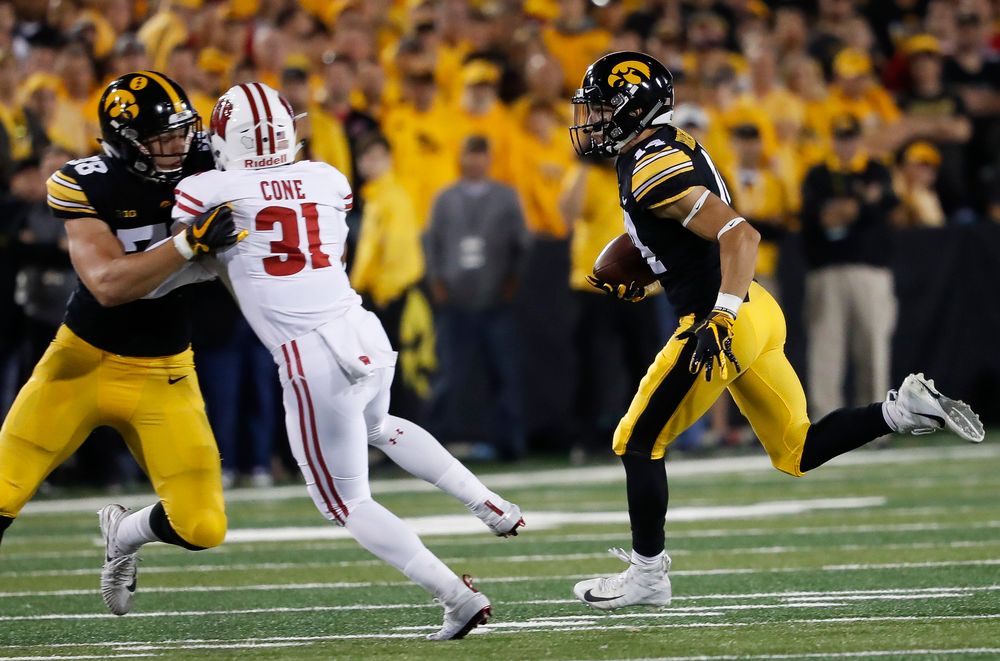 Iowa Hawkeyes wide receiver Kyle Groeneweg (14) returns a punt during a game against Wisconsin at Kinnick Stadium on September 22, 2018. (Tork Mason/hawkeyesports.com)