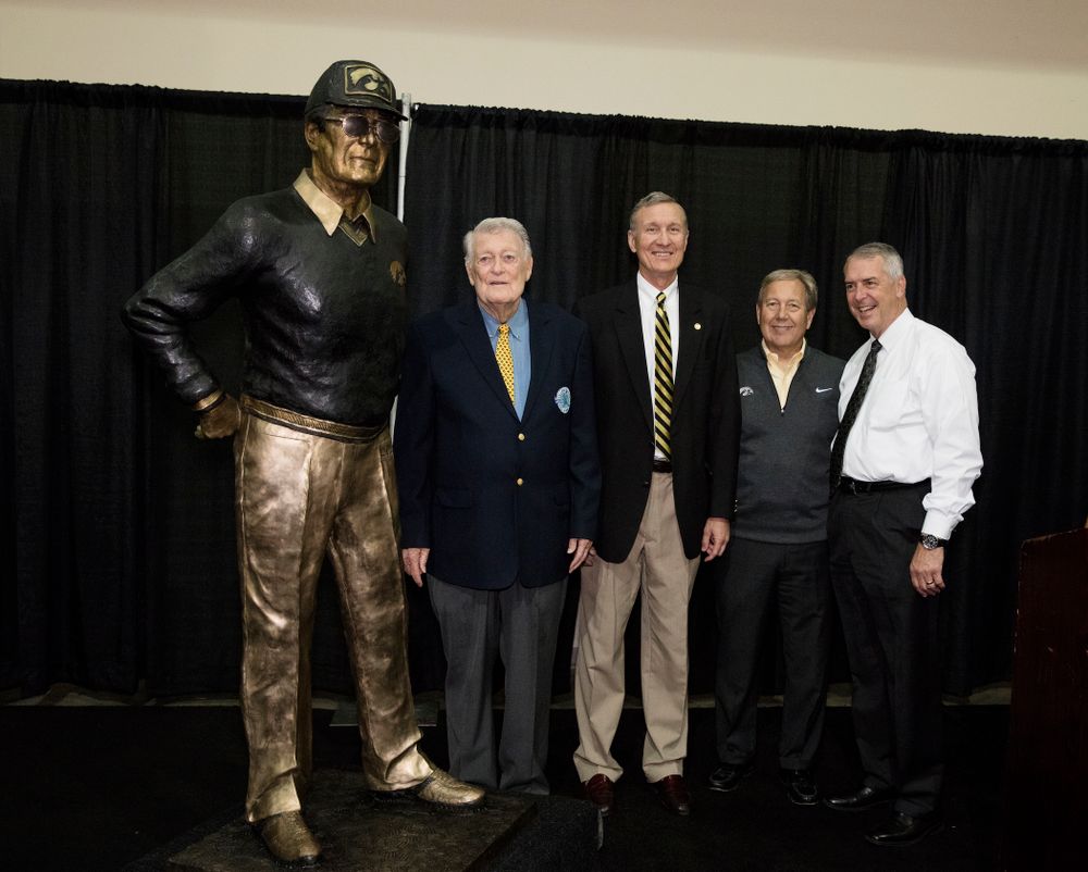 Legendary Hawkeye Football Coach Hayden Fry stands with UI President Bruce Harreld and UI Director of Athletics Gary Barta, and MidWestOne Bank president and CEO Charlie Funk following the unveiling of his statue during Fry Fest Friday, September 2, 2016 at the Coralville Marriott Hotel and Conference Center. (Brian Ray/hawkeyesports.com)