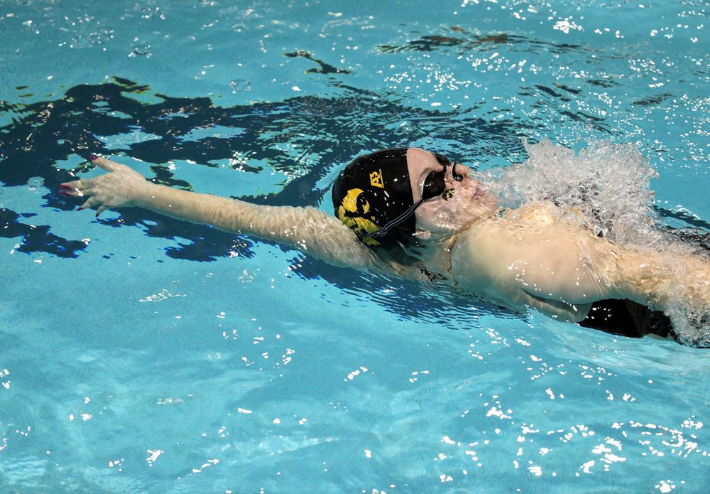 Iowa's Natalie McGovern swims the 100-yard backstroke against the Iowa State Cyclones in the Iowa Corn Cy-Hawk Series Friday, December 7, 2018 at at the Campus Recreation and Wellness Center. (Brian Ray/hawkeyesports.com)