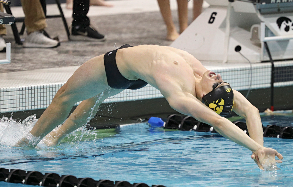 Iowa’s John Colin swims the men’s 50-yard backstroke event during their meet against Michigan State at the Campus Recreation and Wellness Center in Iowa City on Thursday, Oct 3, 2019. (Stephen Mally/hawkeyesports.com)