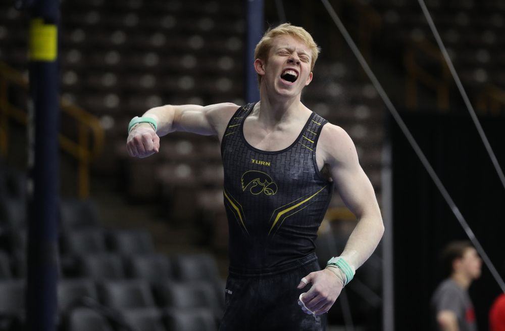Iowa's Nick Merryman competes on the high bar against the Ohio State Buckeyes Saturday, March 16, 2019 at Carver-Hawkeye Arena. (Brian Ray/hawkeyesports.com)