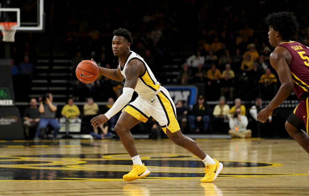 Iowa Hawkeyes guard Joe Toussaint (1) against the Minnesota Golden Gophers Monday, December 9, 2019 at Carver-Hawkeye Arena. (Brian Ray/hawkeyesports.com)