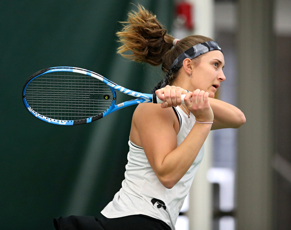 Iowa’s Ashleigh Jacobs returns a shot during her singles match at the Hawkeye Tennis and Recreation Complex in Iowa City on Sunday, February 16, 2020. (Stephen Mally/hawkeyesports.com)