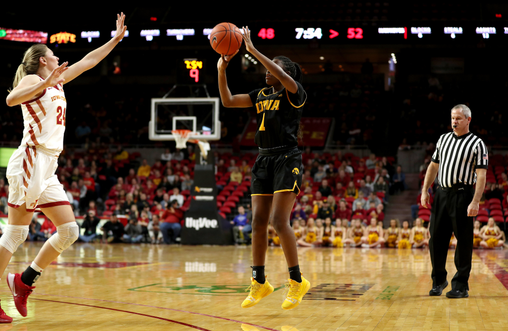 Iowa Hawkeyes guard Tomi Taiwo (1) knocks down a three point basket against the Iowa State Cyclones Wednesday, December 11, 2019 at Hilton Coliseum in Ames, Iowa(Brian Ray/hawkeyesports.com)