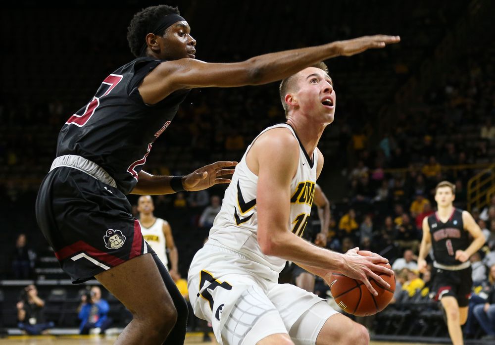 Iowa Hawkeyes guard Joe Wieskamp (10) goes up for a shot during a game against Guilford College at Carver-Hawkeye Arena on November 4, 2018. (Tork Mason/hawkeyesports.com)