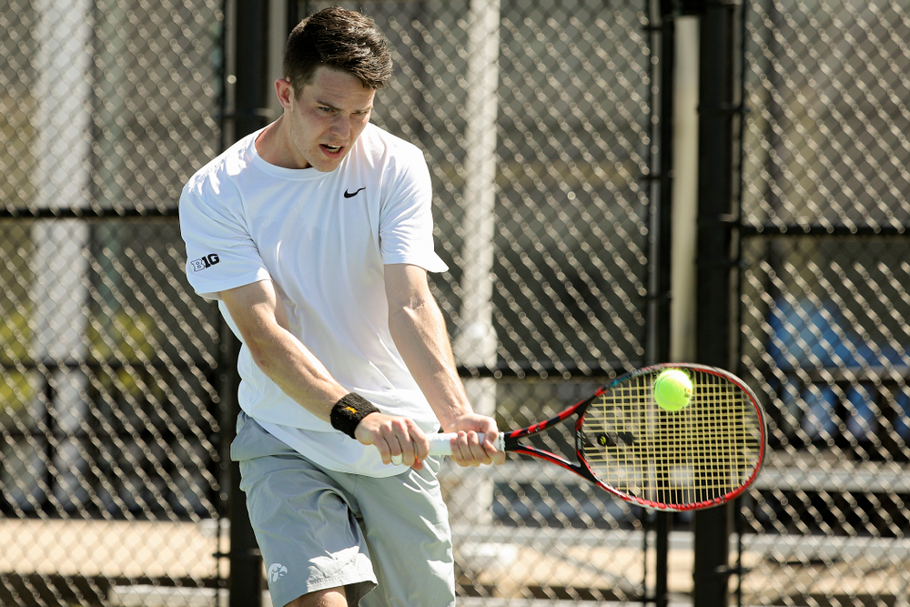Iowa's Jonas Larson during his match against Michigan at the Hawkeye Tennis and Recreation Complex in Iowa City on Sunday, Apr. 21, 2019. (Stephen Mally/hawkeyesports.com)