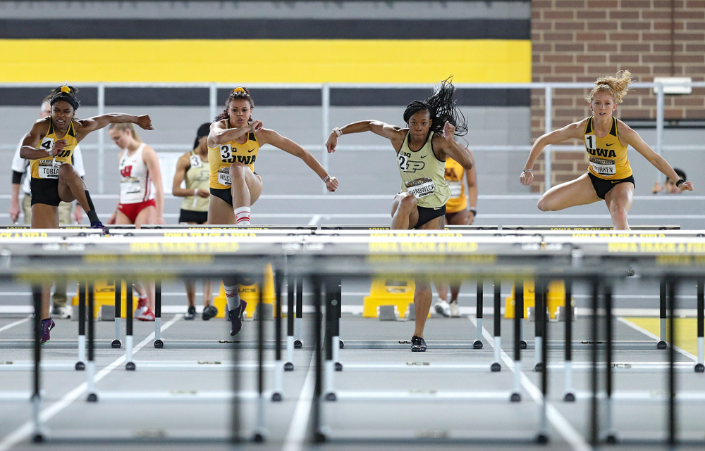 Iowa’s Tionna Tobias (from left), Dallyssa Huggins, and Kylie Morken run the women’s 60 meter hurdles premier preliminary event during the Larry Wieczorek Invitational at the Recreation Building in Iowa City on Saturday, January 18, 2020. (Stephen Mally/hawkeyesports.com)