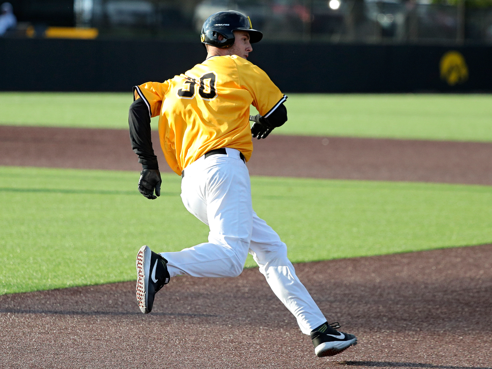 Iowa outfielder Connor McCaffery (30) rounds first base after hitting a 2-run double during the fourth inning of the first game of the Black and Gold Fall World Series at Duane Banks Field in Iowa City on Tuesday, Oct 15, 2019. (Stephen Mally/hawkeyesports.com)